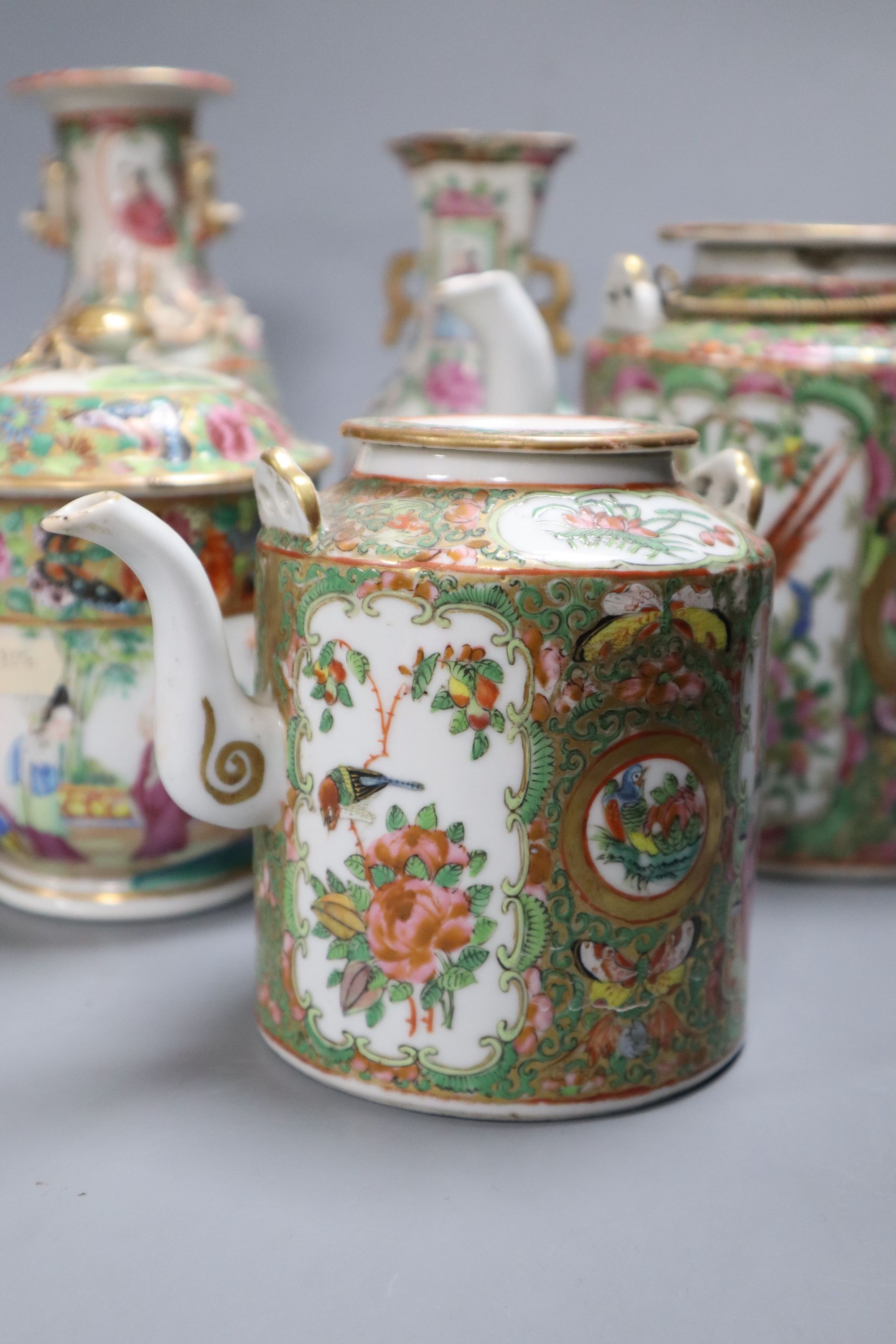 A group of Chinese famille rose tea wares and vases, 18th/19th century, tallest 20cm, (8), damage